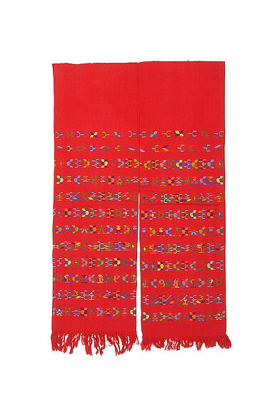 Pantalon d'homme en coton rouge (2 lés) décor tissé de 12 bandes polychromes à motifs figuratifs et géométriques. Franges (vers 1970)