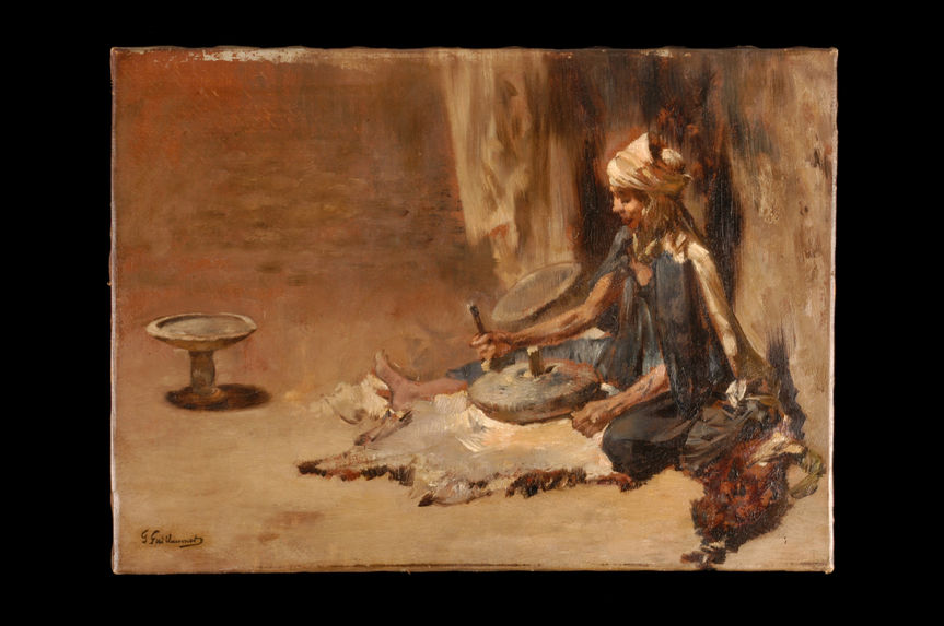 Femme arabe préparant le couscous