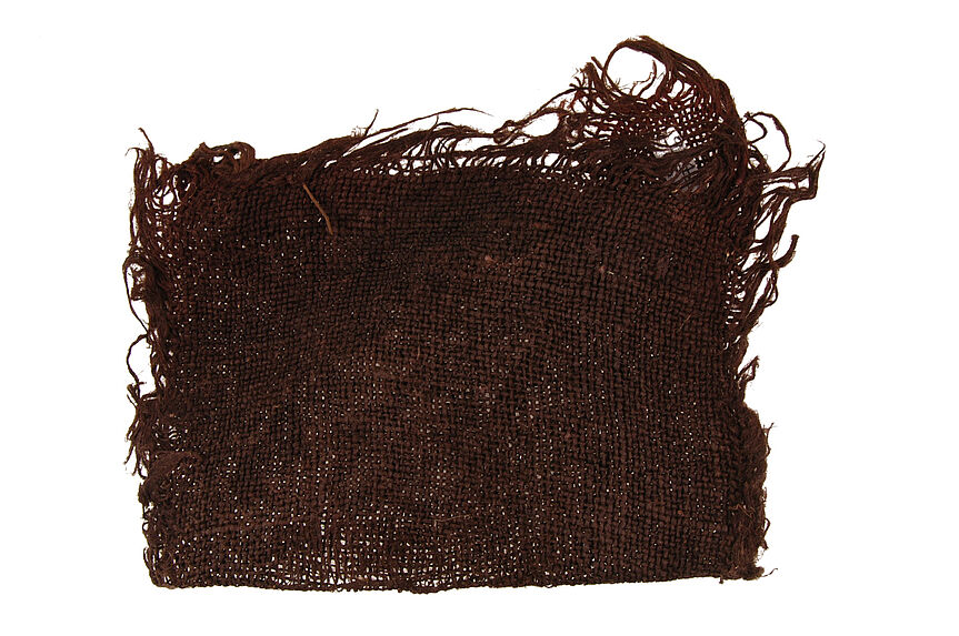 Matériel pour l'impression à la planche : Morceau de toile de jute, bangra, posé sur la claie