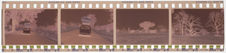 Bande-film de 4 vues concernant un village et une voiture