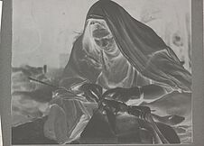 Delma, femme de l'Aménokhal, fabriquant une cravache. Campement Oued…