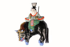 Figurine représentant Tenjin monté sur un buffle