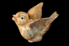 Figurine représentant un oiseau