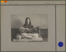 Jeune femme tadjik de Samarkand jouant du doutar