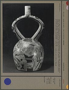 Vase à anse en étrier en céramique peinte polychrome
