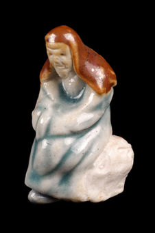Figurine représentant un homme assis