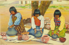 Pueblo indian women making Pottery