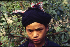 Jeune garçon au marché de Muong Hum