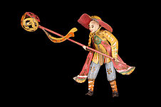 Jouet représentant un personnage défilant lors de la danse de la licorne